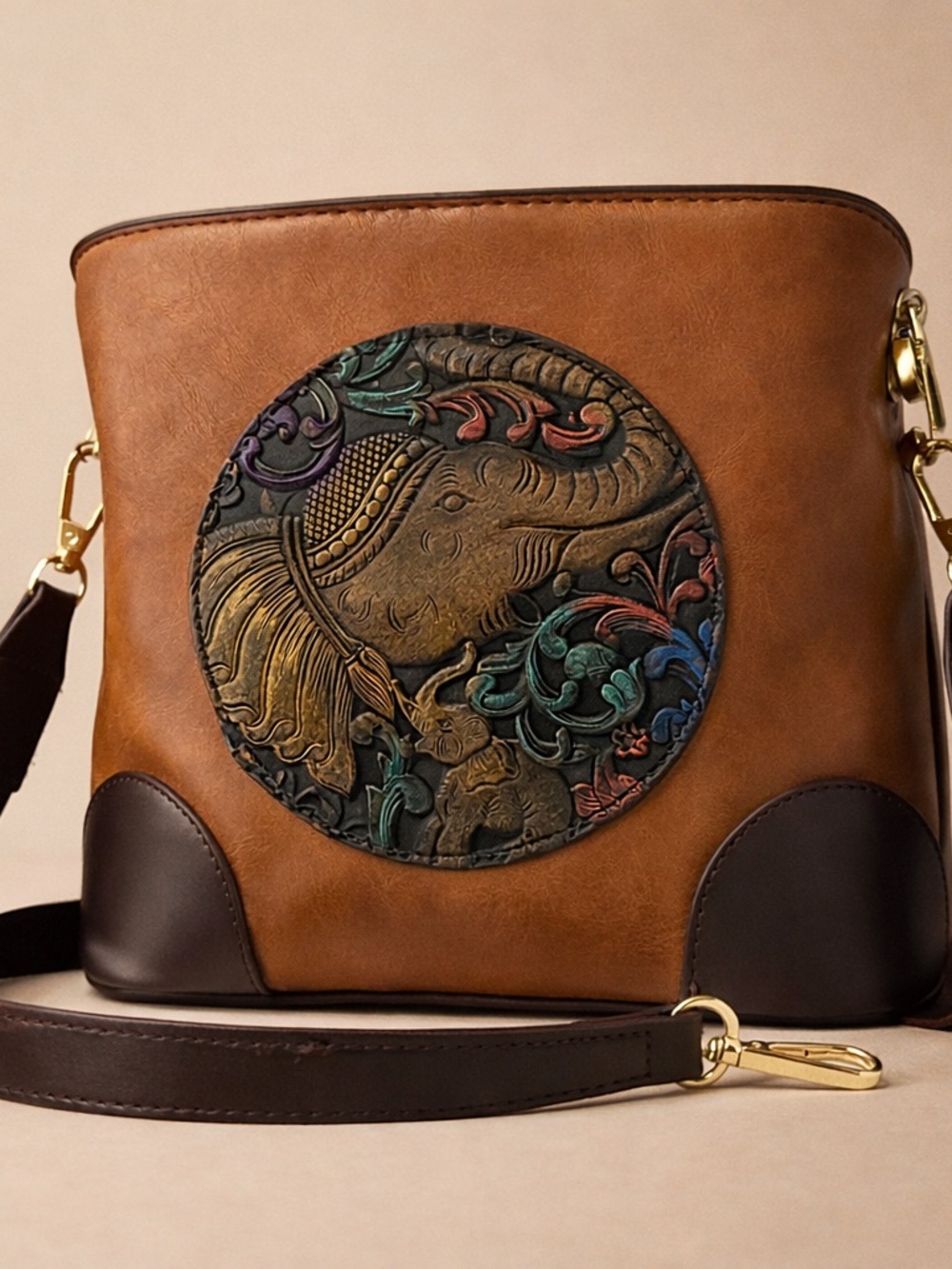 Handcrafted Brown Leather Shoulder Bag with Embossed Elephant Motif